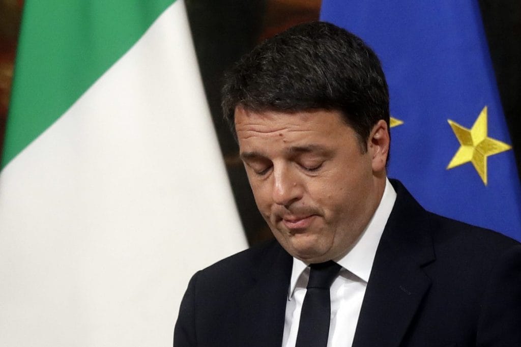 Italian Premier Matteo Renzi speaks during a press conference at the premier's office Chigi Palace in Rome, early Monday, Dec. 5, 2016. Renzi acknowledged defeat in a constitutional referendum and announced he will resign on Monday. Italians voted Sunday in a referendum on constitutional reforms that Premier Matteo Renzi has staked his political future on. (AP Photo/Gregorio Borgia)